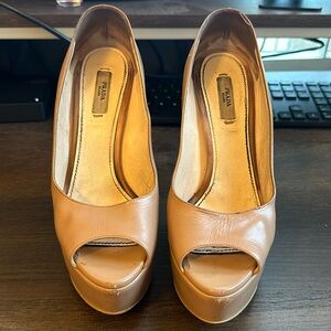 PRADA simple and sexy leather platform peep-toe heels
